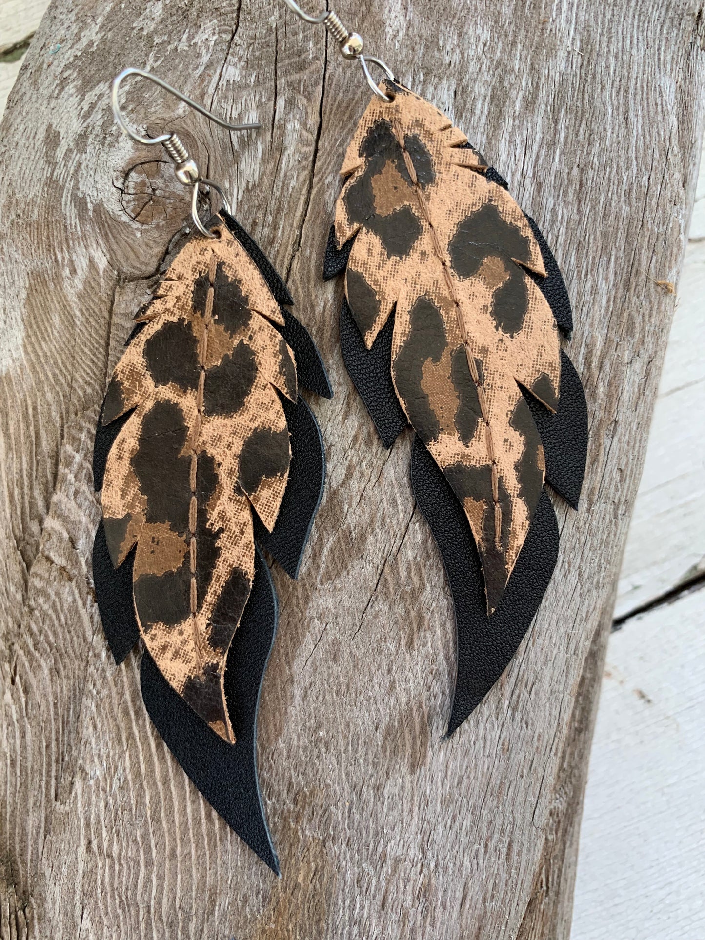Leopard Print on Black Feathers - Leather Earrings